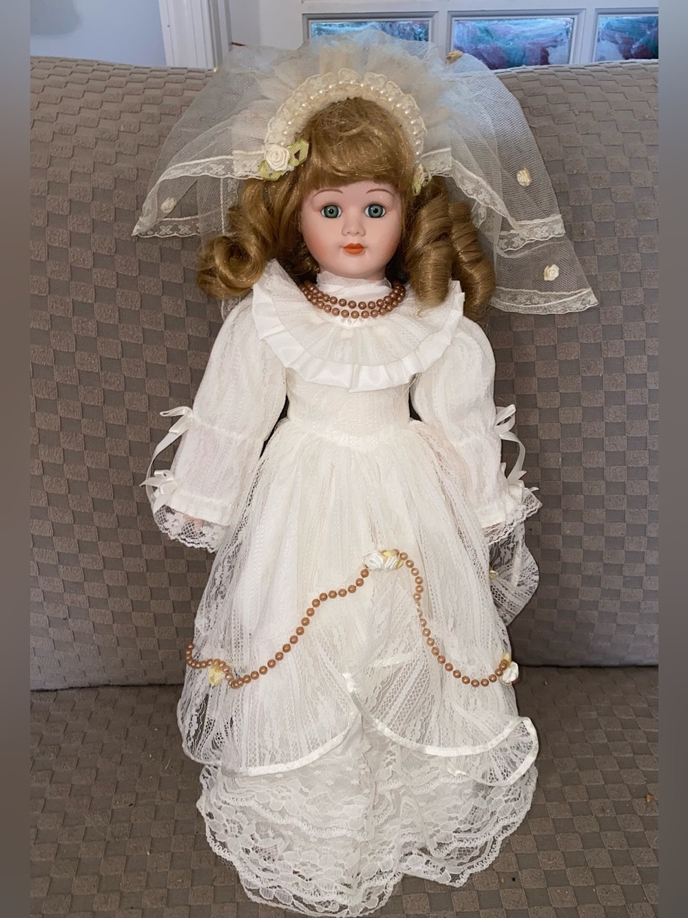 Porcelain Bride Doll in White Lace Gown with Veil